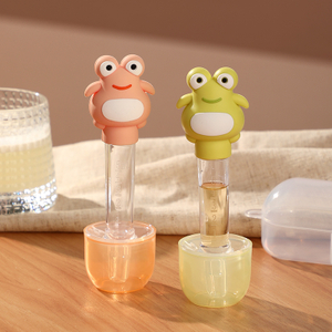 Alimentador de medicina para bebés en forma de rana de dibujos animados